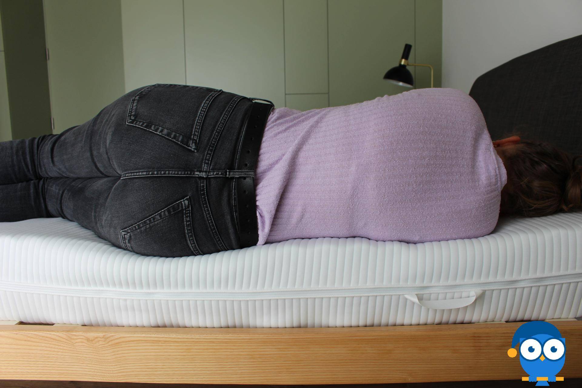 a girl is sleeping on memory foam mattress